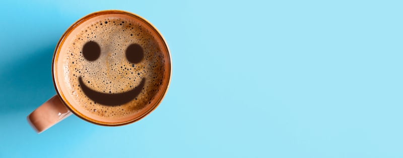 smiley face in morning coffee