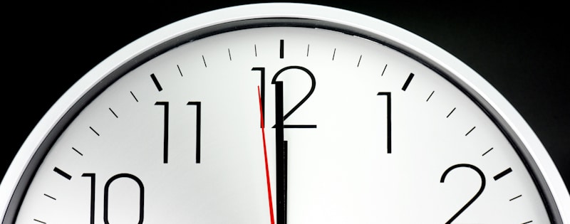 clock shows twelve at noon
