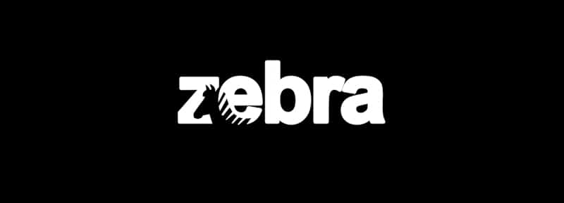 zebra sign in white letters with stripes