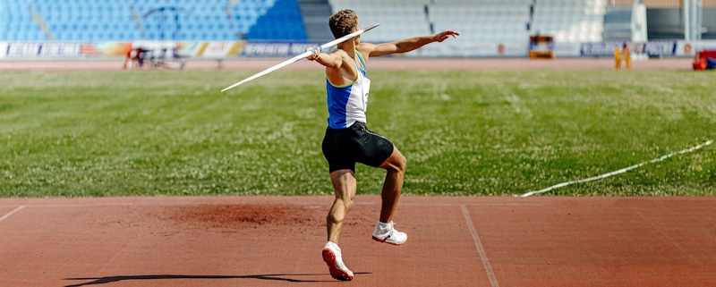 athlete throws javeline