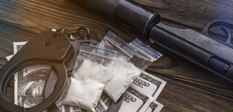 illicit items drugs money gun 1