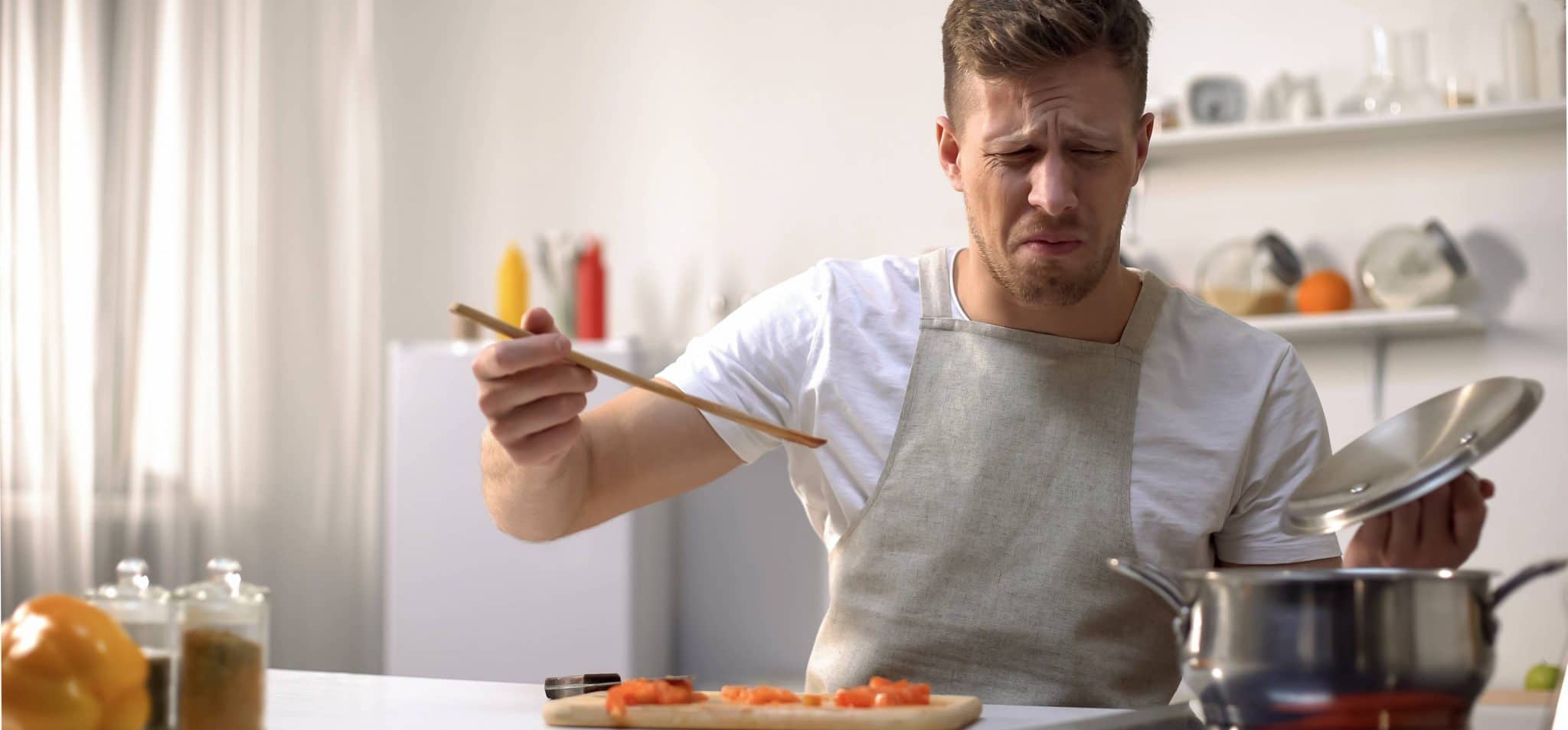 Guycookingtastingthefood