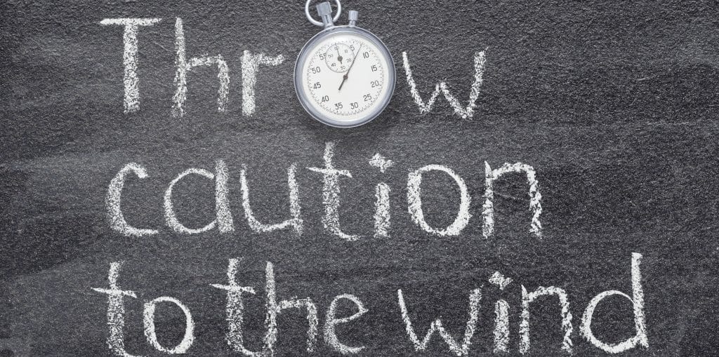 What Does "Throwing Caution To The Wind" Mean? How To Use It