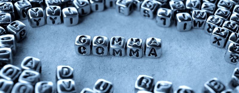 comma spelled with metal dices