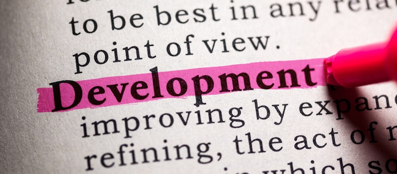 development highlighted in dictionary