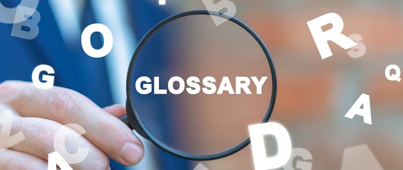 glossary written under magnifying glass