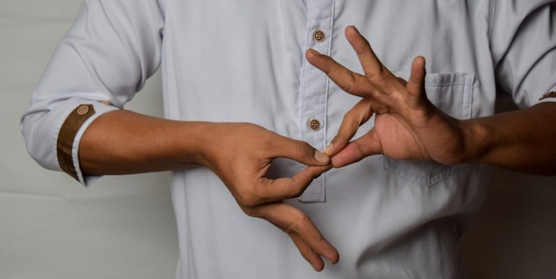 hands showing sign language