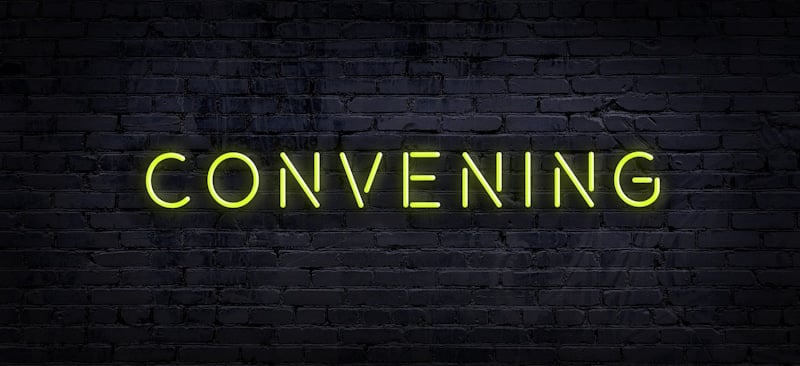 convening word in neon sign