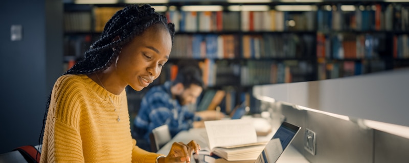 africa girl library writing