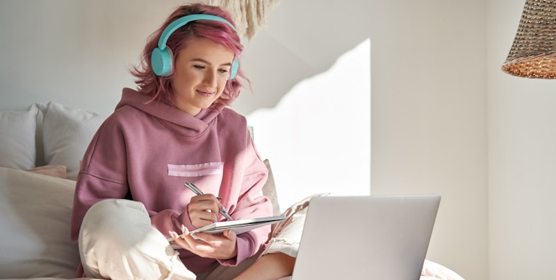 pinky young woman headphones