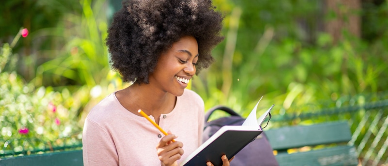 afro woman reading 1