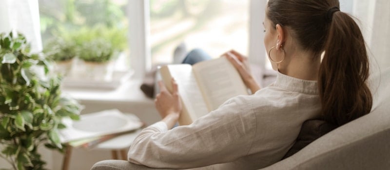 house woman sofa reading