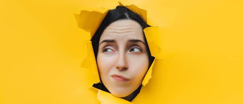 woman thinking yellow