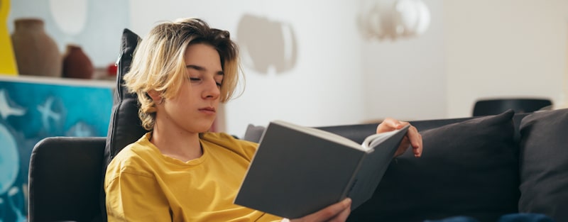 young guy reading